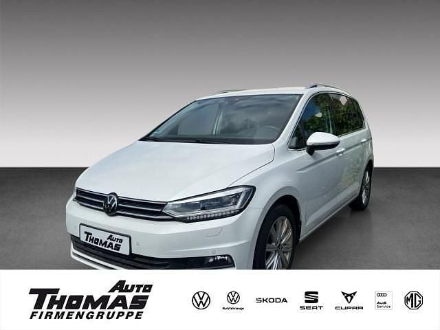 Gebraucht VW Touran Highline 150 PS (110 kW) 2024 Oryxweiß perlmutteffekt Van / Kleinbus
