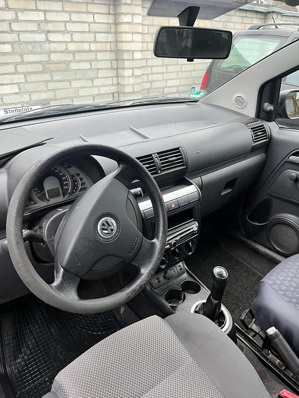 Gebraucht VW Fox 94 PS (69 kW) 2007 Schwarz Kleinwagen