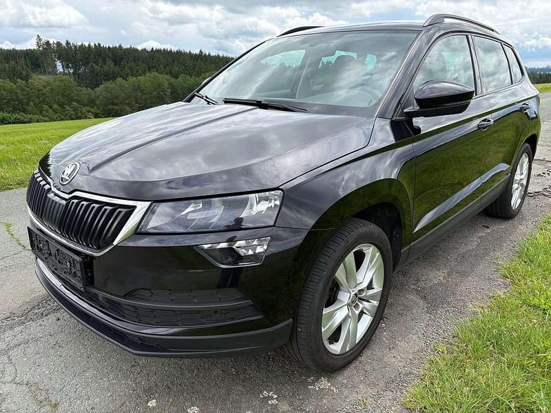 Cerna magic/black magic Gebraucht 2021 Skoda Karoq Style SUV | 15.999 € - Bild 1/4