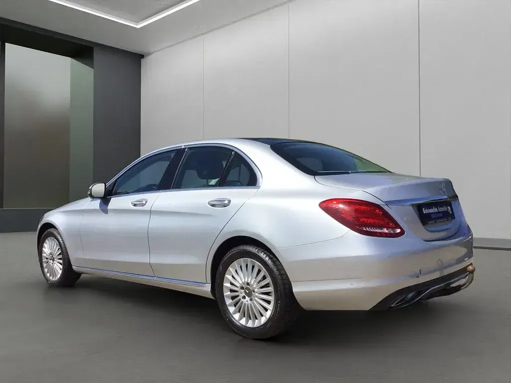 Gebraucht Mercedes C400 Exclusive 333 PS (244 kW) 2019 Silber / iridiumsilber (metallic) Limousine