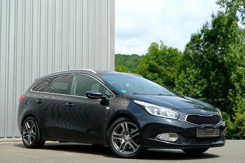 Schwarz Gebraucht 2015 Kia Ceed Sportswagon DREAM-TEAM Edition Kombi | 7.730 € (Fairer Preis) - Bild 1/4
