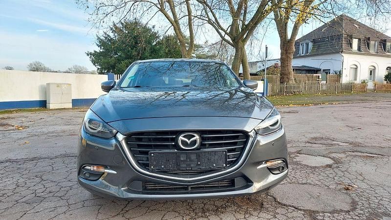Grau Gebraucht 2017 Mazda 3 Sports-Line Limousine | 10.500 € (Fairer Preis) - Bild 1/4