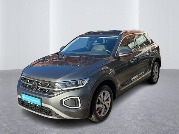 Grau (indiumgrau metallic) Gebraucht 2022 VW T-Roc Style SUV | 26.991 € (Fairer Preis) - Bild 1/4