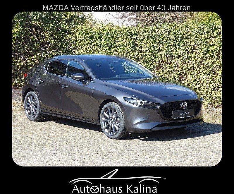 Machine gray Neu 2025 Mazda 3 Exclusive-Line Limousine | 28.900 € - Bild 1/4