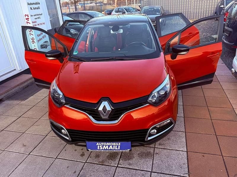 Orange enz + schwarz gne Gebraucht 2014 Renault Captur Dynamique SUV | 9.555 € (Fairer Preis) - Bild 1/4