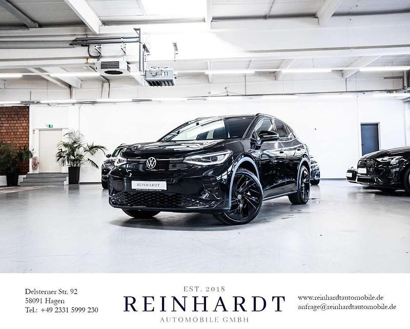 Grenadillschwarz metallic Gebraucht 2023 VW ID.4 GTX SUV | 34.130 € (Superpreis) - Bild 1/3