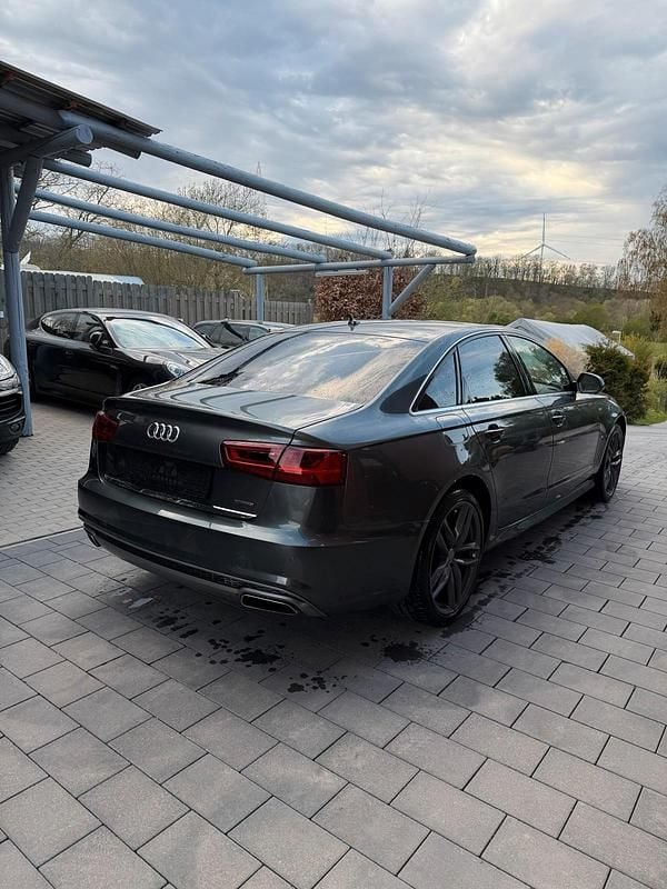 Używany Audi A6 S-Line 218 KM (160 kW) 2016 Czarny Sedan/Limuzyna