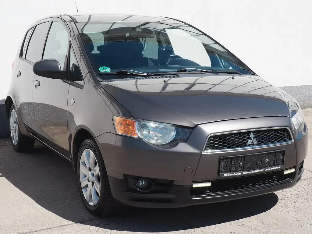 Gebraucht Mitsubishi Colt Motion 95 PS (69 kW) 2011 Braun Kleinwagen