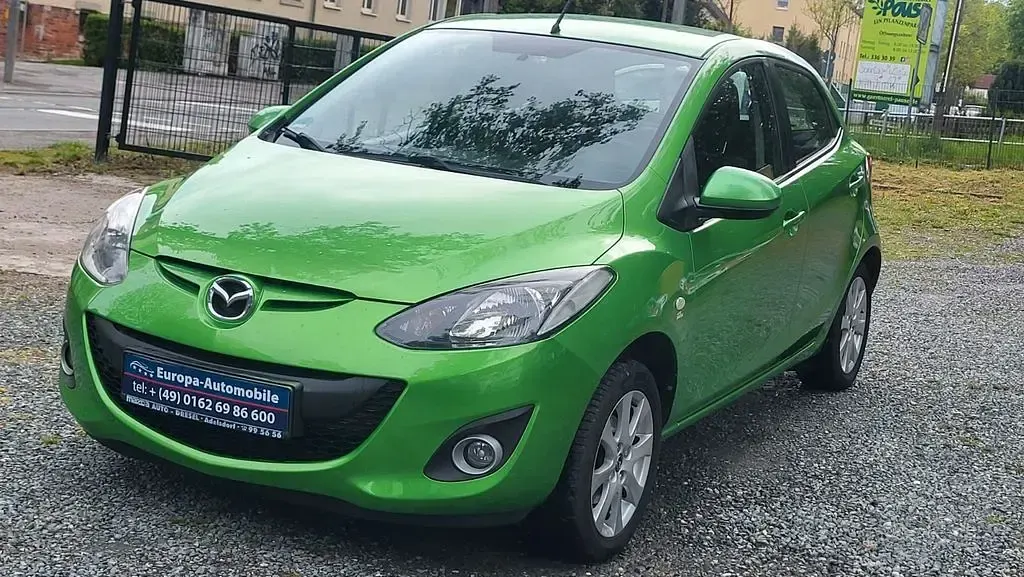 Gebraucht Mazda 2 75 PS (55 kW) 2013 Grün Kleinwagen