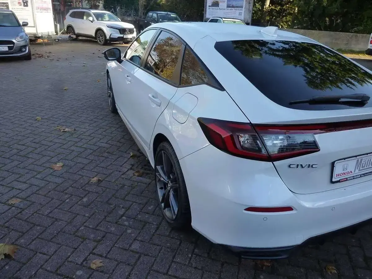 Gebraucht Honda Civic Hybrid 143 PS (105 kW) 2026 Platinum white p. Limousine