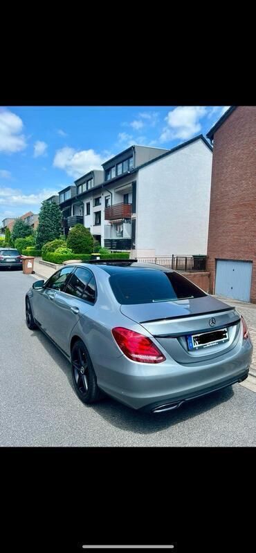 Grau Gebraucht 2016 Mercedes C200 Limousine | 17.999 € - Bild 1/4