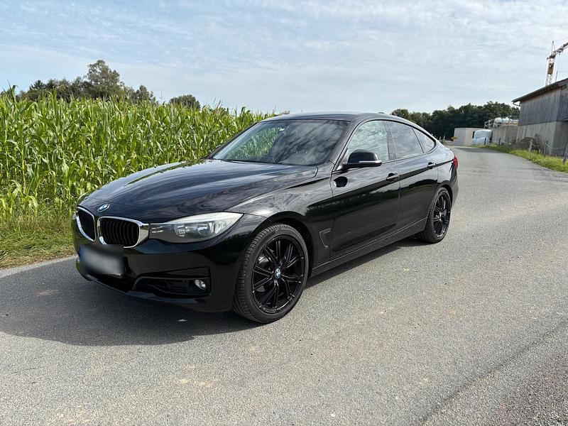 Schwarz Gebraucht 2014 BMW 320 Gran Turismo Limousine | 9.790 € - Bild 1/4