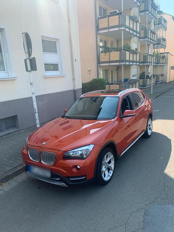 Orange Gebraucht 2012 BMW X1 xLine SUV | 8.700 € (Superpreis) - Bild 1/4