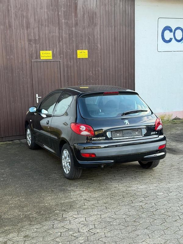 Gebraucht Peugeot 206 60 PS (44 kW) 2009 Schwarz Kleinwagen