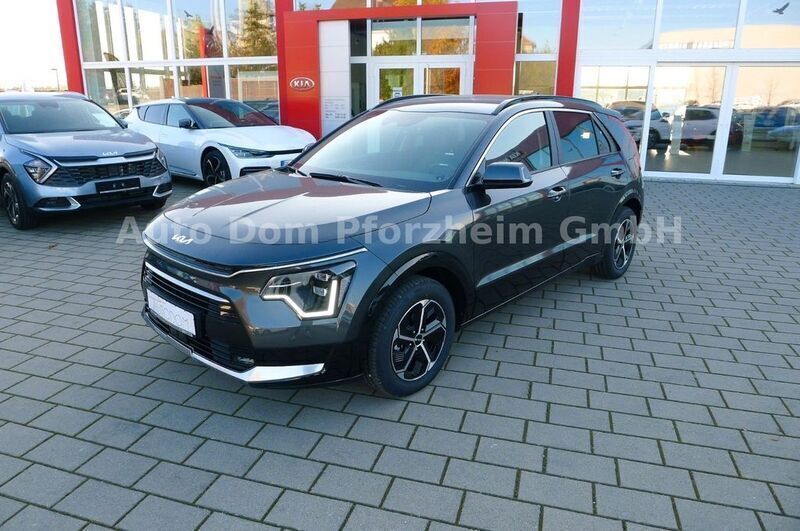Interstellar grau met. (agt) Gebraucht 2024 Kia Niro Comfort SUV | 34.990 € (Fairer Preis) - Bild 1/4
