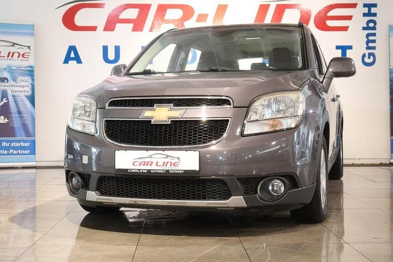 Grau Gebraucht 2012 Chevrolet Orlando LT Van / Kleinbus | 7.888 € (Fairer Preis) - Bild 1/4