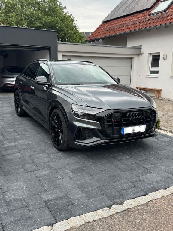 Grau Gebraucht 2023 Audi SQ8 Sport SUV | 81.350 € (Superpreis) - Bild 1/4