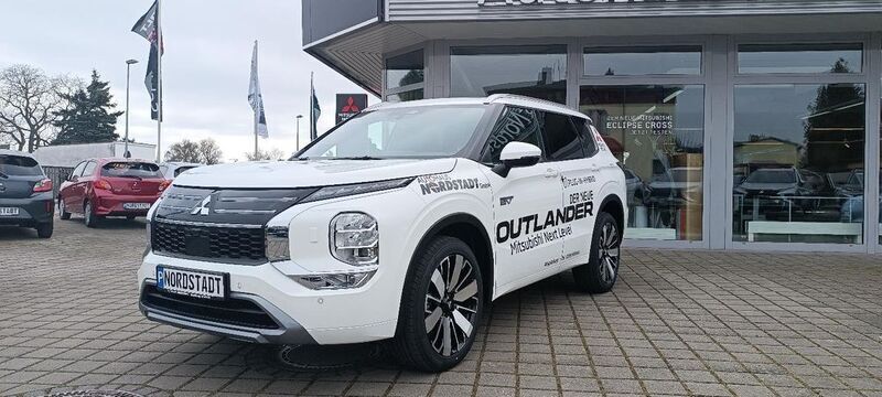 Weiß Neu 2025 Mitsubishi Outlander P-HEV Top SUV | 58.990 € (Teuer) - Bild 1/4