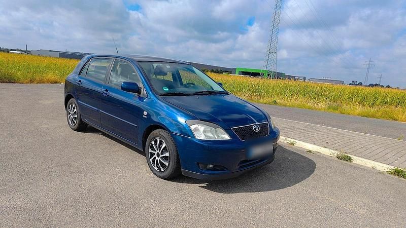 Blau Gebraucht 2004 Toyota Corolla Limousine | 3.699 € (Fairer Preis) - Bild 1/4