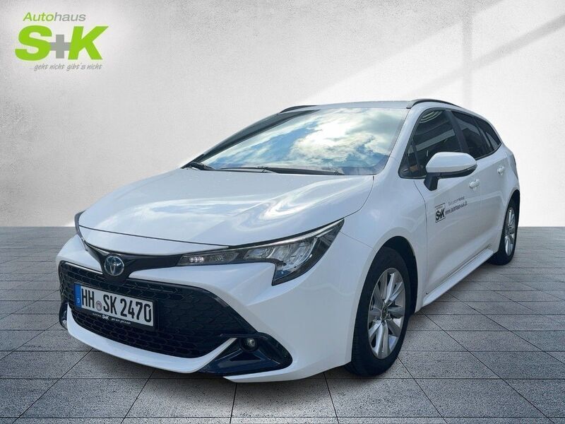 Schneeweiß Gebraucht 2023 Toyota Corolla Comfort Kombi | 25.890 € (Fairer Preis) - Bild 1/4