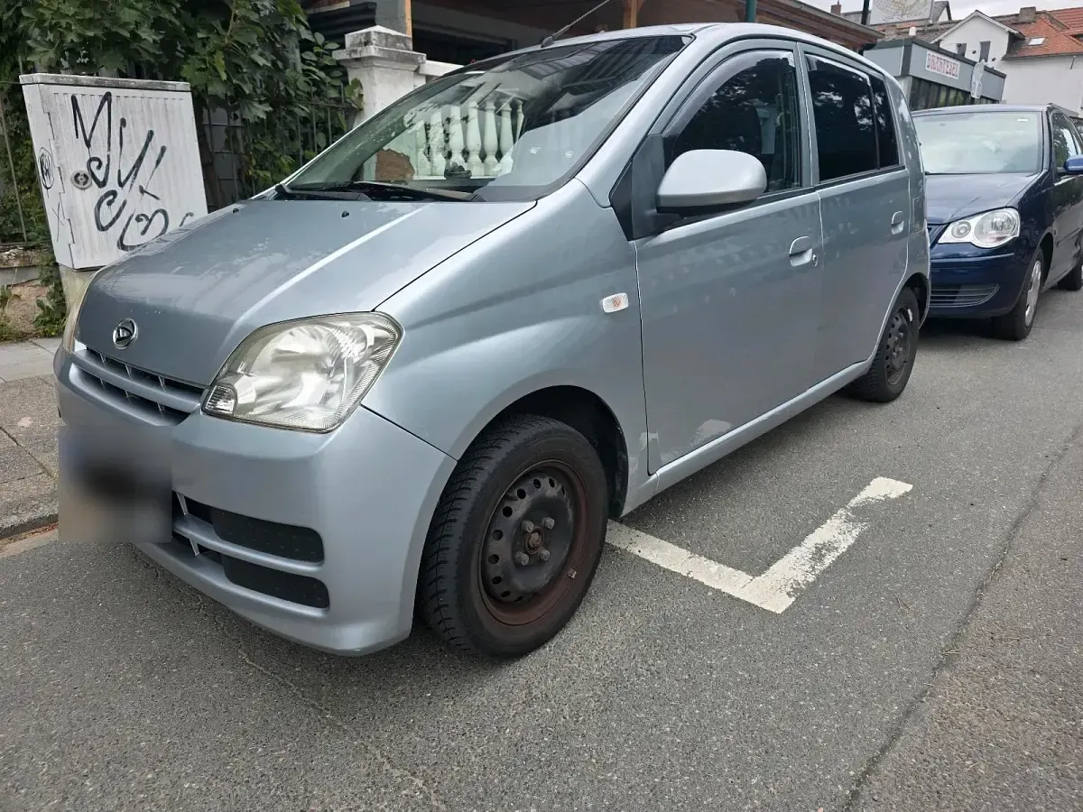 Gebraucht Daihatsu Cuore 58 PS (42 kW) 2006 Silber Kleinwagen