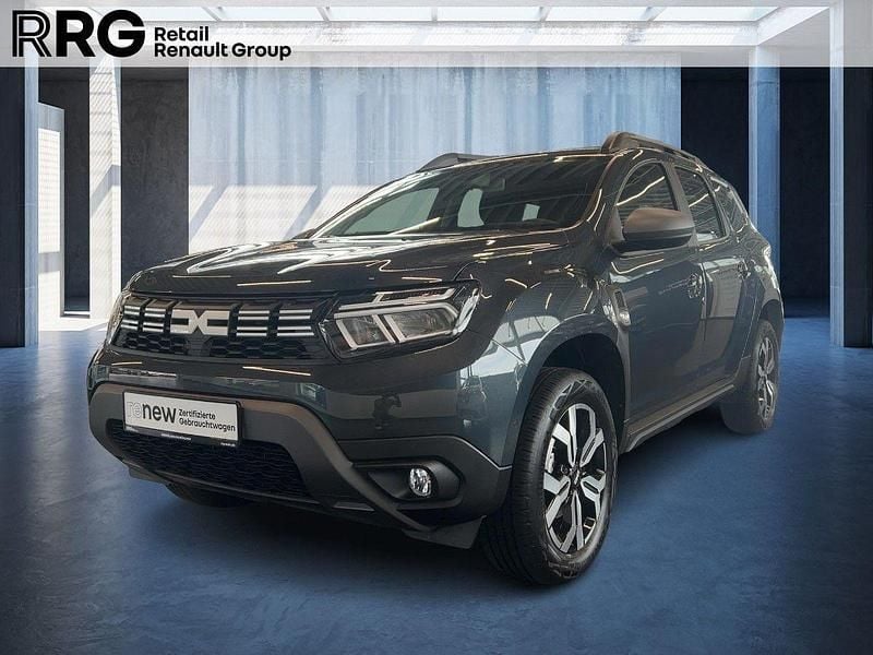 Kometengrau Gebraucht 2024 Dacia Duster Journey SUV | 23.980 € (Fairer Preis) - Bild 1/3