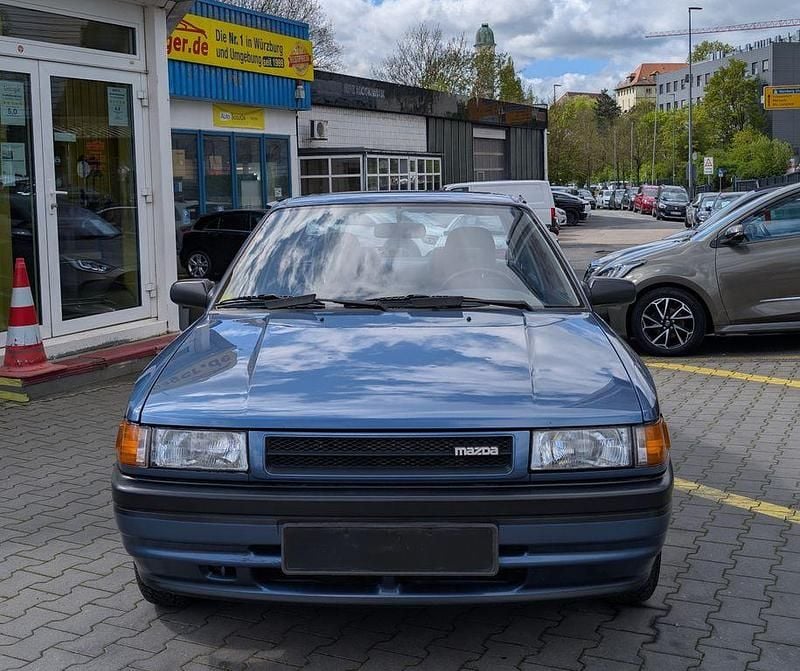 Second-hand Mazda 323 84 CP (61 kW) 1991 Albastru Berlinǎ