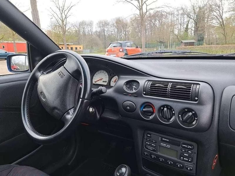 Gebraucht Ford Escort Cabriolet Ghia 90 PS (66 kW) 1997 Blau Cabrio