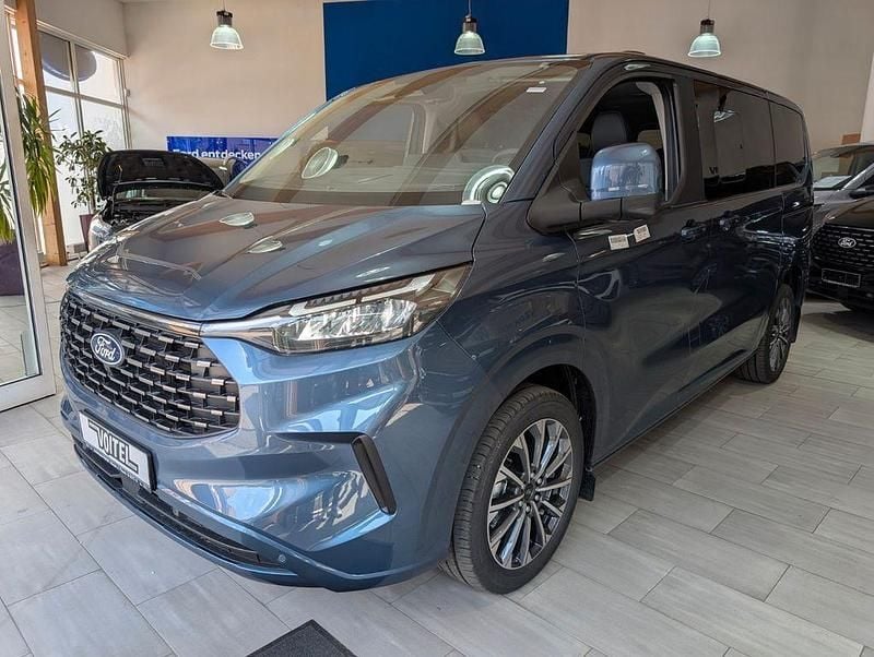 Blau Neu 2025 Ford Tourneo Custom Titanium X Van / Kleinbus | 49.385 € (Superpreis) - Bild 1/4
