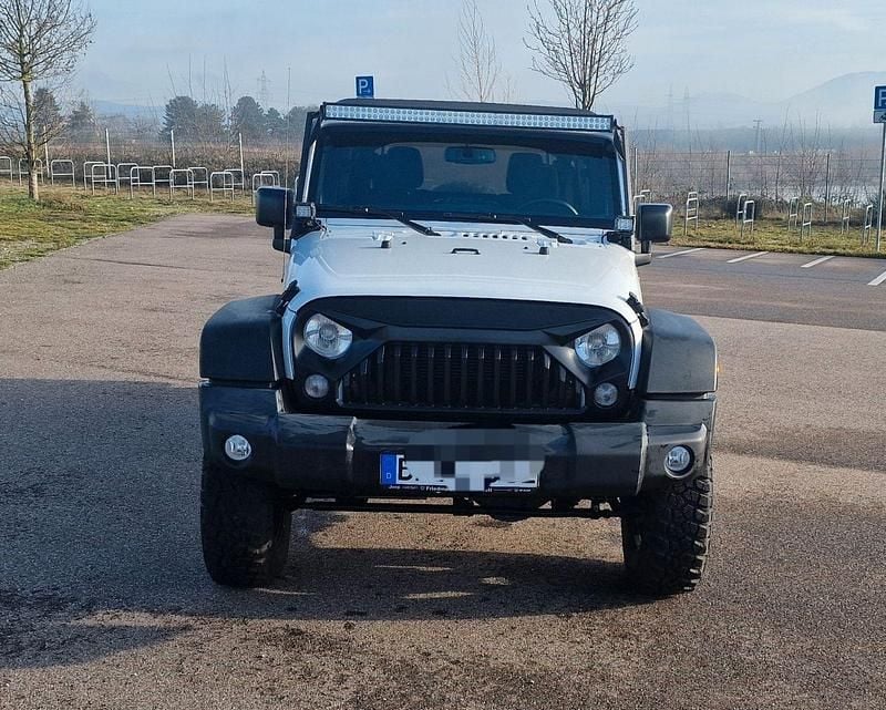 Weiß Gebraucht 2017 Jeep Wrangler Unlimited Sport SUV | 33.900 € (Guter Preis) - Bild 1/4