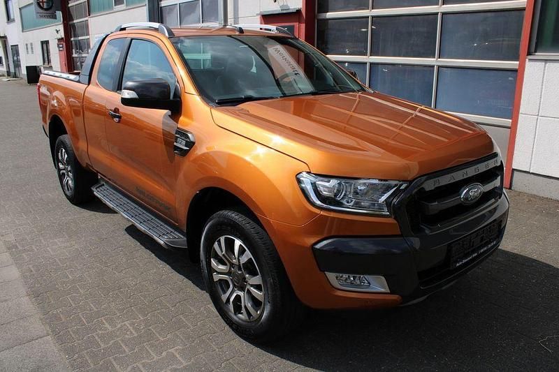 Orange (metallic) Gebraucht 2016 Ford Ranger Wildtrack Abholung | 19.999 € (Fairer Preis) - Bild 1/4