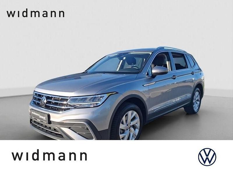 Pyritsilber metallic Gebraucht 2024 VW Tiguan Allspace Life SUV | 33.990 € (Fairer Preis) - Bild 1/4