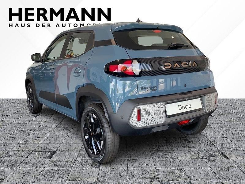 Gebraucht Dacia Spring Extreme 47 kW (65 PS) 2024 Schieferblau (blau) Kleinwagen