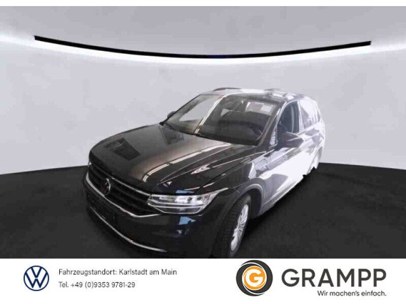 Grau Gebraucht 2021 VW Tiguan Life SUV | 29.970 € (Teuer) - Bild 1/3