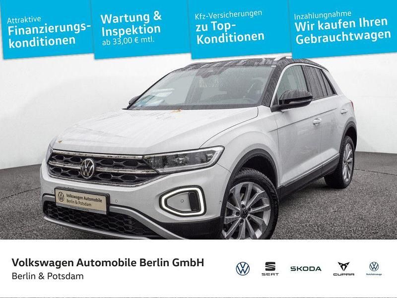 Pure white/schwarz Gebraucht 2024 VW T-Roc Style SUV | 29.950 € (Fairer Preis) - Bild 1/4