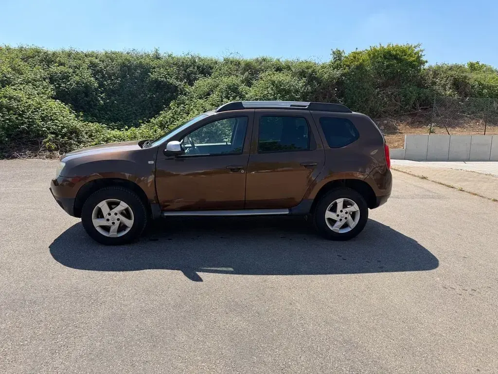 Gebraucht Dacia Duster Basis 105 PS (77 kW) 2011 Braun SUV