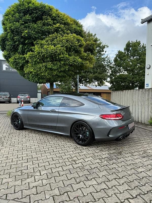 Grau Gebraucht 2017 Mercedes C400 AMG line Coupé | 34.900 € - Bild 1/4