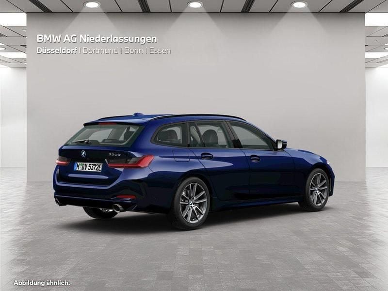 Gebraucht BMW 330e Sport Line 292 PS (214 kW) 2024 Blau Kombi