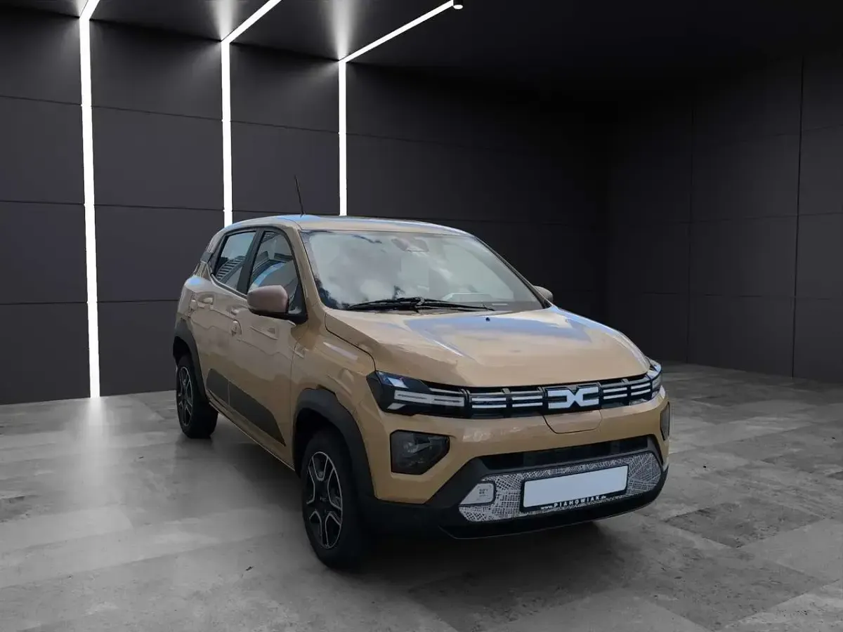Używany Dacia Spring Extreme 47 kW (65 KM) 2024 Beżowy Hatchback