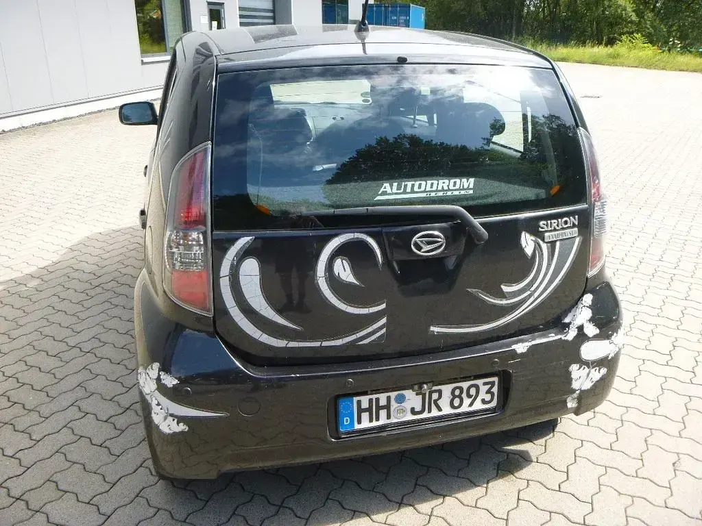 Gebraucht Daihatsu Sirion 91 PS (66 kW) 2009 Schwarz Kleinwagen