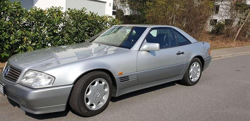 Astralsilbermetallic Gebraucht 1992 Mercedes SL300 Cabrio | 32.900 € - Bild 1/4
