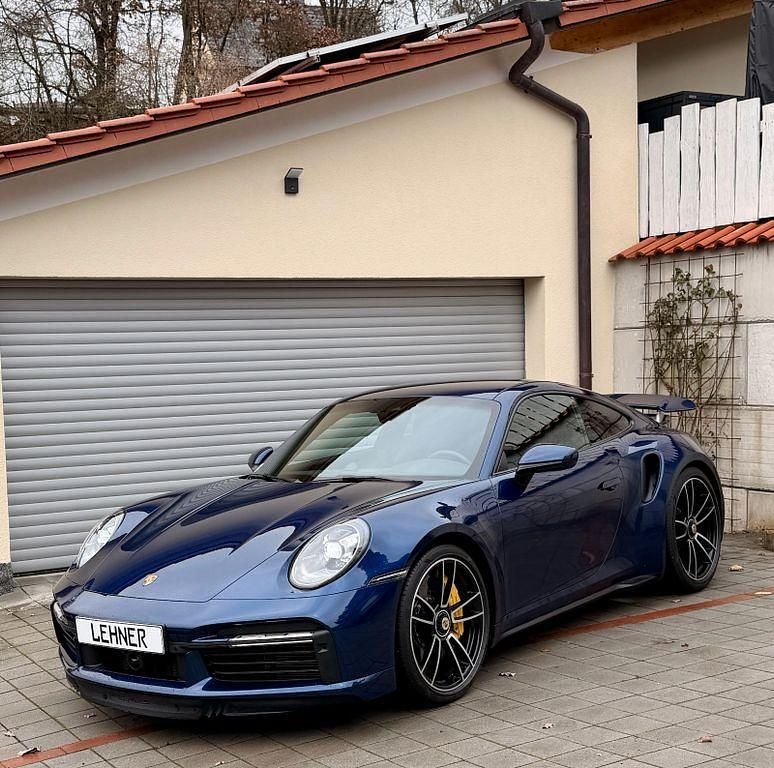 Blau Gebraucht 2023 Porsche 911 Turbo S | 214.999 € - Bild 1/4