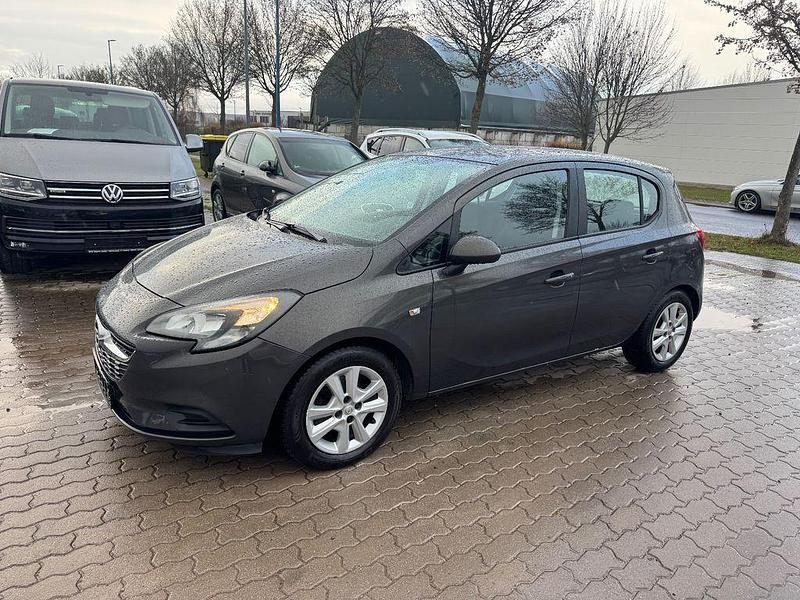 Grau Gebraucht 2015 Opel Corsa Selection Limousine | 5.600 € (Fairer Preis) - Bild 1/4