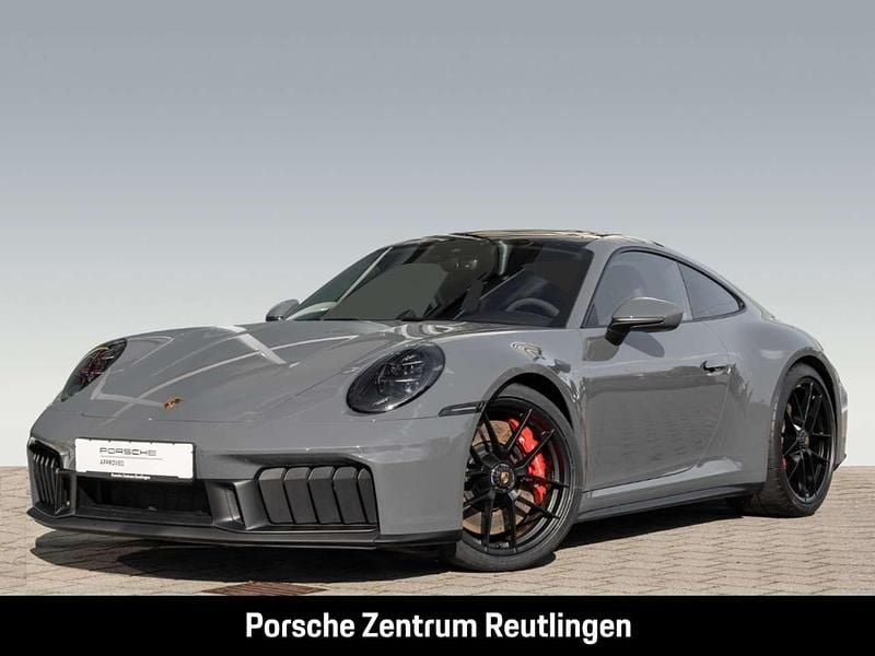 Grau Gebraucht 2024 Porsche 911 Carrera 4 GTS Coupé | 197.911 € - Bild 1/4