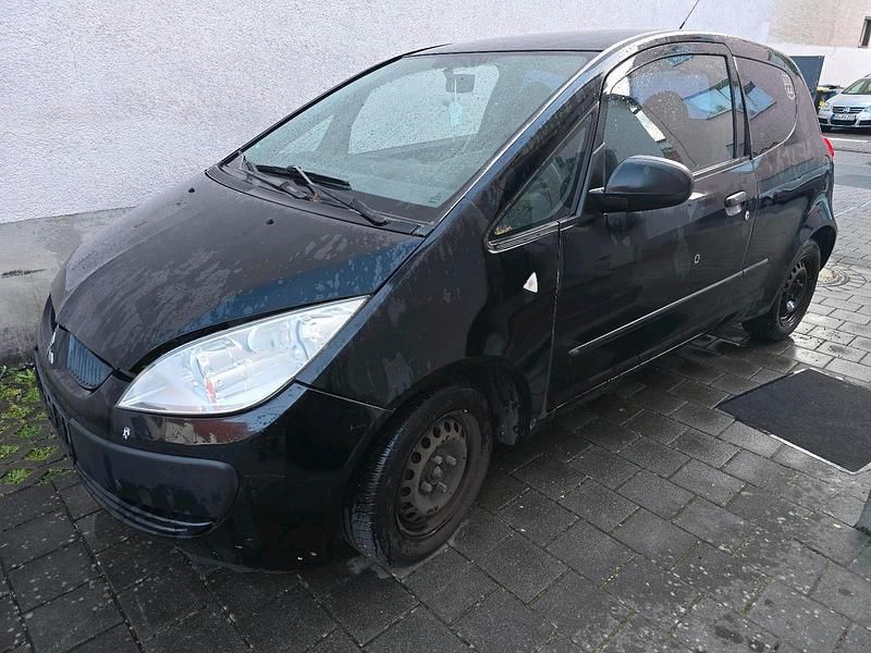 Second-hand Mitsubishi Colt 95 CP (69 kW) 2007 Negru Hatchback