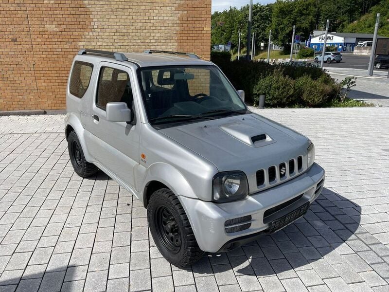 Silber Gebraucht 2010 Suzuki Jimny SUV | 5.999 € (Superpreis) - Bild 1/4