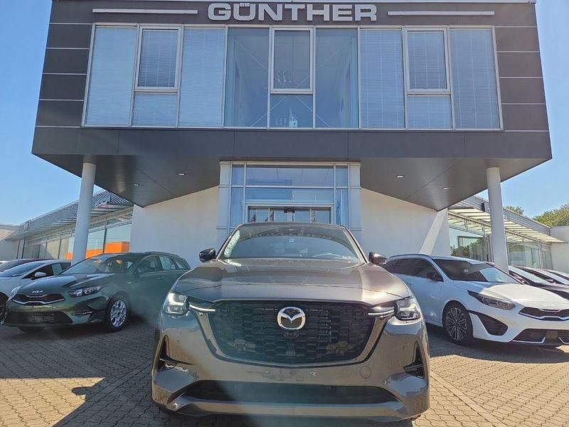 Machine gray Neu 2025 Mazda CX-60 Homura-Line SUV | 48.490 € (Guter Preis) - Bild 1/4