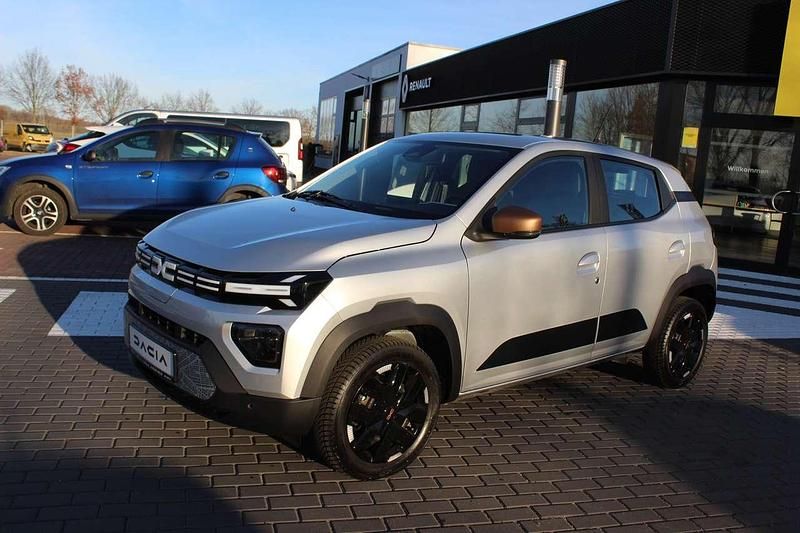 Gebraucht Dacia Spring Extreme 47 kW (65 PS) 2024 Diamantsilbergrau Kleinwagen