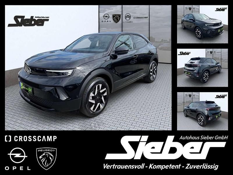 Lackierung schwarz perla nera/ Gebraucht 2025 Opel Mokka Elegance SUV | 25.990 € (Teuer) - Bild 1/4