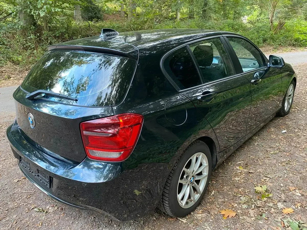 Używany BMW 118 143 KM (105 kW) 2014 Czarny Hatchback